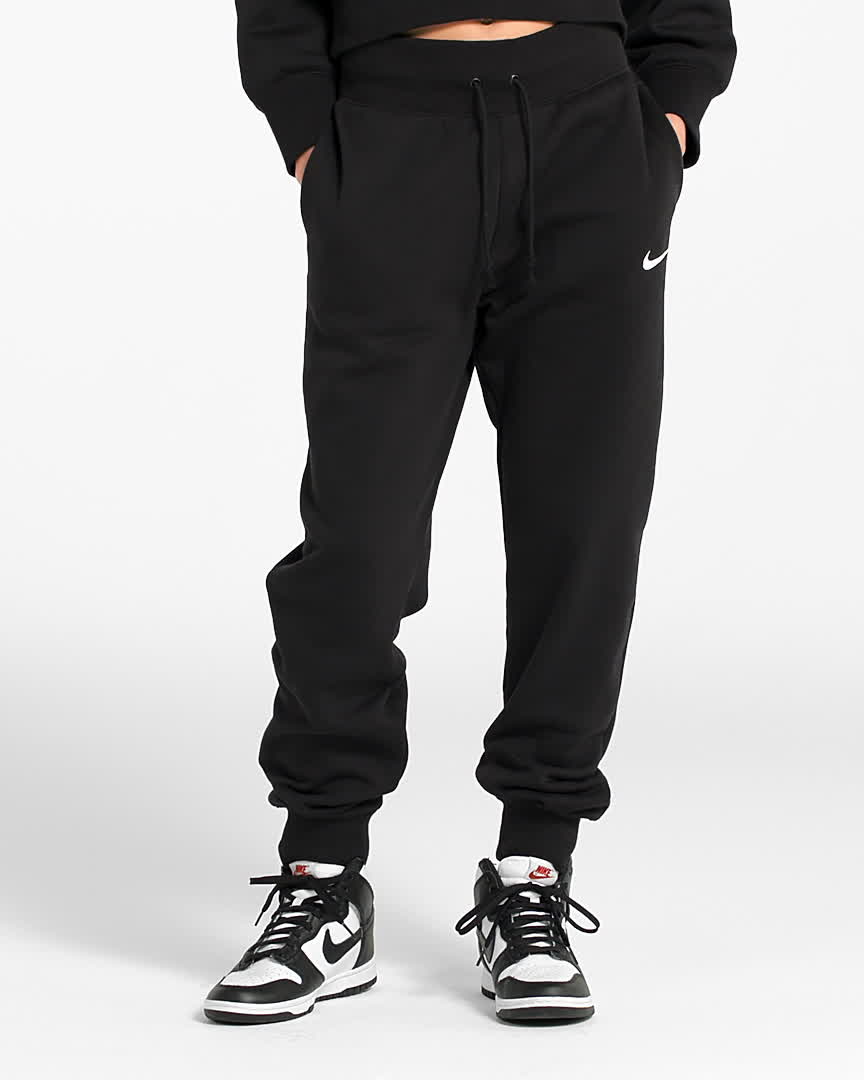 Calças desportivas de cintura subida Nike Sportswear Phoenix Fleece para  mulher. Nike PT