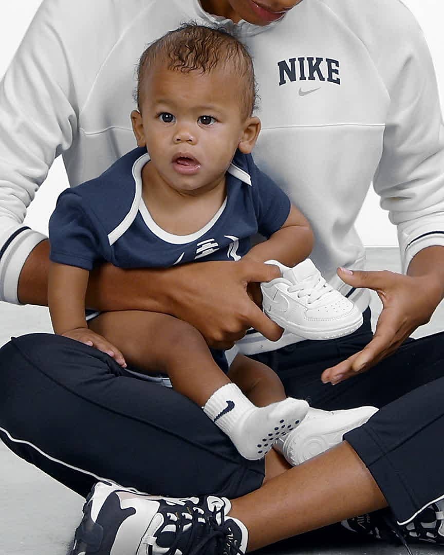 baby wearing air force 1