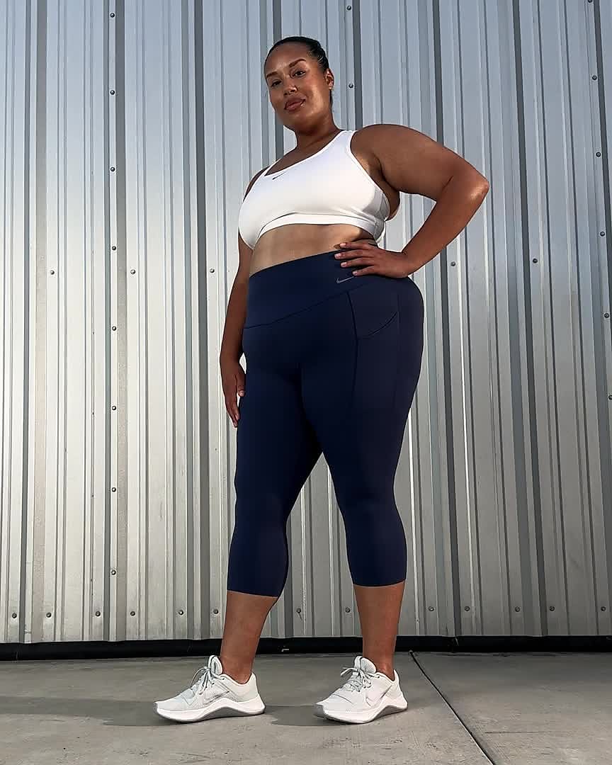 Leggings de largo completo y cintura alta de media sujeción para mujer Nike  Universa con bolsillos (talla grande)