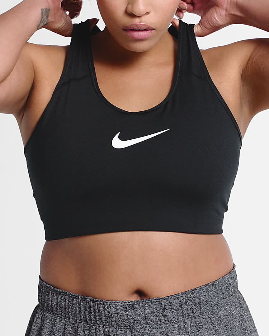 Sujetador deportivo sin acolchado de sujeción media talla grande para mujer  Nike Dri-FIT Swoosh. Nike.com