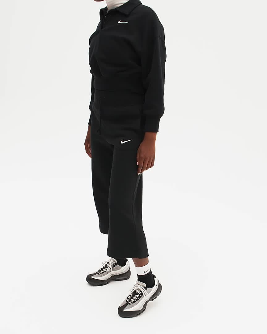 Calças de fato de treino de cintura normal Nike Sportswear Phoenix Fleece  para mulher. Nike PT